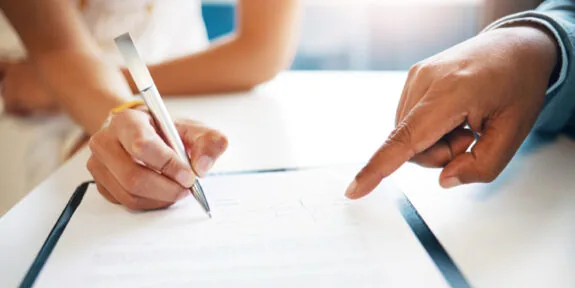 Professionals reviewing a contract